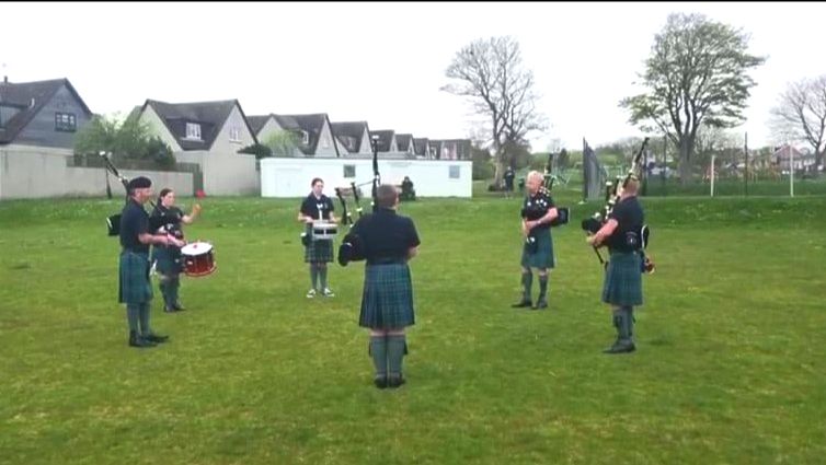 VE celebrations - group playing bagpipes